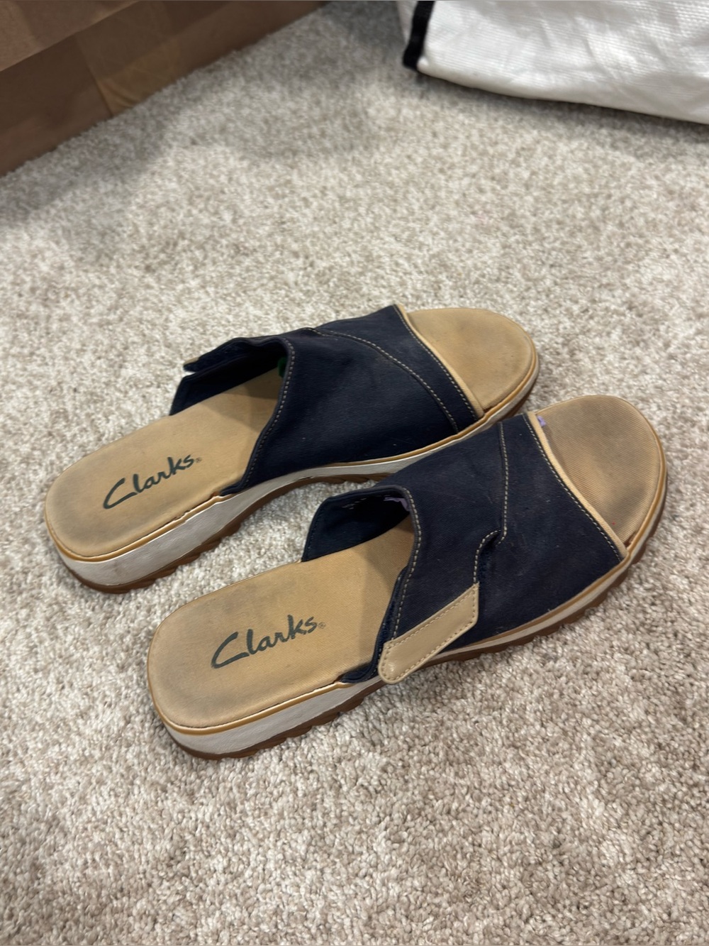 Clarks Black and Tan Slip-On Mules